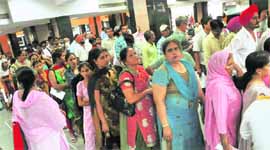 Patients queue up at a counter at the PGI in Chandigarh.