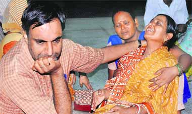 Grieving parents of Anupama in Chandigarh on Tuesday.