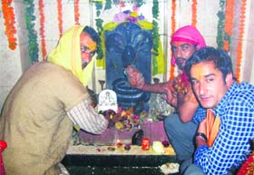 Devotees seek blessings of Lord Nagraj on the concluding day of the Nag Panchami festival at Nag Mandir in Mussoorie on Tuesday