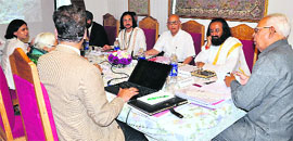 Governor N N Vohra convenes a meeting of the shrine board in Srinagar on Tuesday, which was attended by Sri Sri Ravi Shankar.