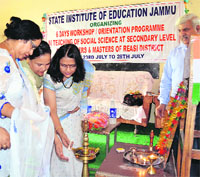 DDC Nirmal Sharma inaugrates a teachers orientation programme at Reasi on Monday.