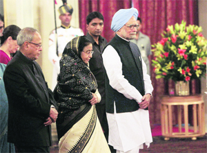 President Pratibha Patil and PM Manmohan Singh at a dinner for President-elect Pranab Mukherjee on Tuesday.
