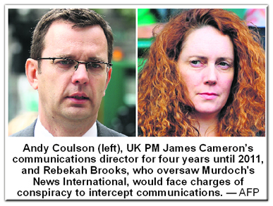 Andy Coulson (left), UK PM James Camerons communications director for four years until 2011, and Rebekah Brooks, who oversaw Murdoch's News International, would face charges of conspiracy to intercept communications.