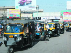 Auto drivers shun the designated parking area and prefer to park their vehicles by the roadside outside the railway station in Bathinda.  