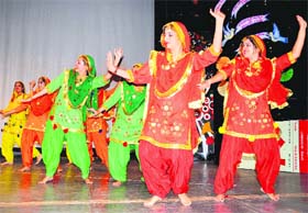 Girls perform Giddha during the induction day function at the MCMDAV College, Sector 36, Chandigarh, on Wednesday