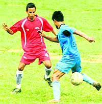 Players in action at the 3rd ONGC BS Negi Memorial Football Tournament in Dehradun on Wednesday