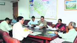 Chief Secretary Alok Kumar Jain chairs a meeting of senior officials in Dehradun on Wednesday. A Tribune photograph