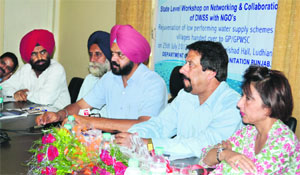 A meeting of officials of the department of water supply and sanitation and NGOs under way in Ludhiana on Wednesday.