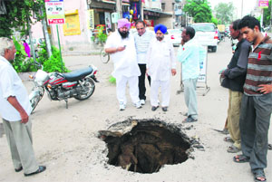 A crater was formed on the Montgomery Chowk road in Ludhiana on Wednesday.