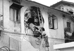 A unique tribute Artist Ranjit Dahiya works on a mural of late actor Rajesh Khanna on the wall of a building in Mumbai on Wednesday.  AFP