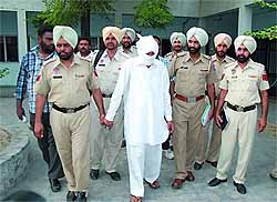 Gagandeep, the accused in four cases of snatchings outside the State Bank of Patiala, at the Kotwali police station in Bathinda on Thursday