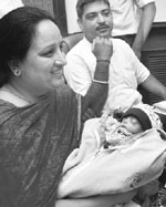 The smallest baby with the parents at the Fortis Hospital in Mohali on Thursday. Tribune photo: Vicky Gharu