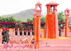 The General Officer Commanding-in-Chief of the Northern Command, Lt Gen KT Parnaik, pays a tribute to the martyrs at the Kargil War Memorial in Drass on Thursday. 