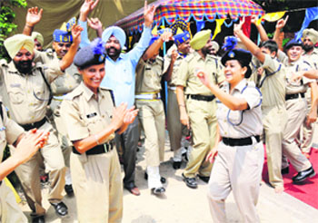 Happy raising day Officers of the Central Reserve Police Force celebrate the 72nd Raising Day of the force in Amritsar on Friday. Photo: Sameer Sehgal