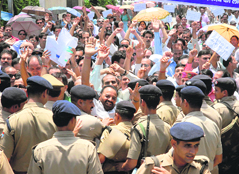 State government employees being stopped by the police on their way to the Secretariat in Dehradun on Friday.