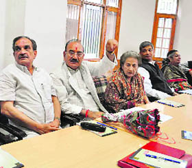 (From left) Congress general secretary Birender Chaudhary, HPCC chief Kaul Singh and CLP leader Vidya Stokes at a meeting of the party in Shimla on Friday. 