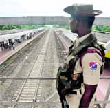 An RPF jawan keeps vigil at Kokrajhar railway station on Friday ahead of Prime Minister Manmohan Singh's visit to the violence-hit district.