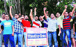 Environment supporters hold a protest in Amritsar on Saturday