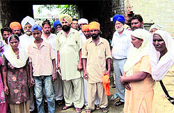 Relatives of Kuldeep Singh protest outside the Verka police station in Amritsar on Saturday