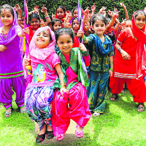 Girls of Sant Isher Singh Public School, Sector 70, having fun during Teej celebrations on the school premises in Mohali on Saturday.