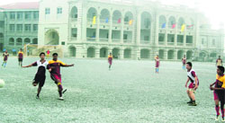 Players in action in a match in the Jackie Memorial Football Tournament in Mussoorie on Saturday. ATribune photograph