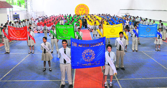 Students participate in the investiture ceremony held at The Aryan School in Dehradun on Saturday. 