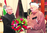 Uttarakhand Governor Aziz Qureshi greets President Pranab Mukherjee in New Delhi.