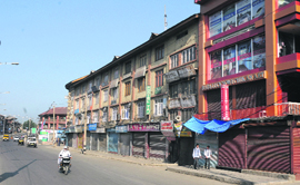 The Budshah Chowk market wears a deserted look following a bandh in Srinagar on Saturday. 