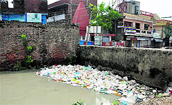 A view of a choked canal in Nai Basti Area in Jammu