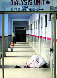 A Muslim offers prayers during Ramadan at GMCH in Jammu