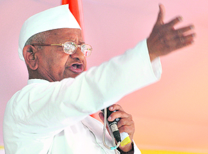 Anna Hazare addresses the gathering in New Delhi on Saturday.