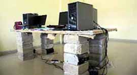 Computers kept on cement blocks.