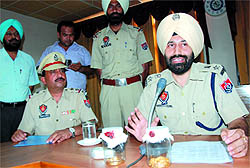 SSP Sukhchain Singh Gill gives details at a press conference in Bathinda on Sunday