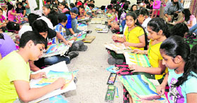 Children take part in an inter-school painting competition at the Kendriya Vihar Society, Sector 48, Chandigarh, on Sunday.