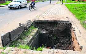 An open trench on a roadside poses a threat to commuters in Sector 49, Chandigarh.