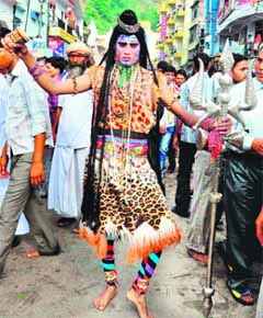 A man in the attire of Lord Shiva was the centre of attraction at Har-ki-Pauri in Haridwar on Sunday.