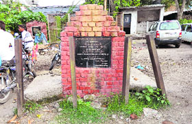 The foundation stone laid by the then Chief Minister Shanta Kumar on November 28, 1992, at the Tehsil Chowk in Kangra.