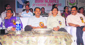 MLA Sanjay Choudhary and DC Rakesh Bharti during a state-level seminar on burn injuries at the Government Polytechnic College in Kangra on Saturday.