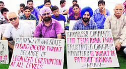 Members of the All-J&K Movement for Peace and Justice stage a protest in support of Anna Hazare in Jammu on Sunday