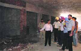 Ludhiana Municipal Commissioner Rakesh Kumar Verma inspects construction work at a pedestrian underpass at Aggar Nagar in Ludhiana
