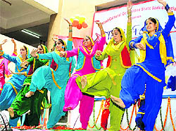 Girls perform during Teej festival in Patiala on Sunday