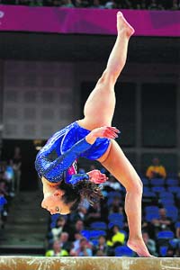 Elisabetta Preziosa of Italy competes in the balance beam during the women's gymnastics qualification round