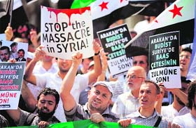 Demonstrators protest against Syrian President Bashar al-Assad in Istanbul