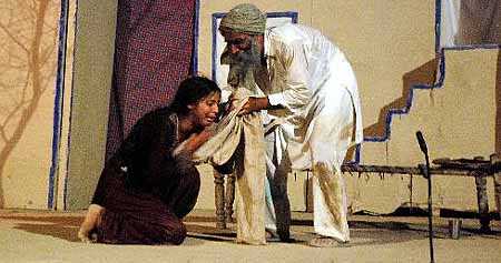 A scene from the play Zindagi staged at the Balwant Gargi Open Air Theatre in the Rose Garden at Bathinda late on Saturday evening. 
