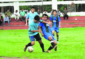 Players in action during a match in the 3rd ONGC-BS Negi Memorial Football Tournament in Dehradun 