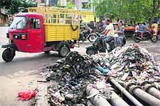 The municipal corporation fails to lift garbage despite imposing sanitary tax on the residents at the Nai Basti market in Jammu.