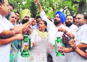 A protest being held against grim power situation in Patiala