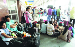 Passengers stranded at Amritsar railway station on Tuesday. photo: vishal kumar