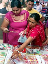 Women shop for rakhis at a market in Bathinda to celebrate the festival of Raksha Bandhan that falls on August 2.