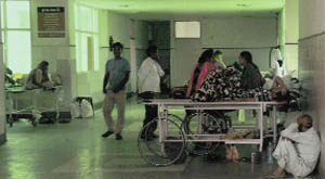 Patients wait in a corridor of the PGI emergency ward on Tuesday afternoon